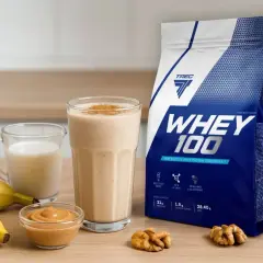 Torba z odżywką białkową WHEY 100, koktajl proteinowy, mleko, masło orzechowe i banan.